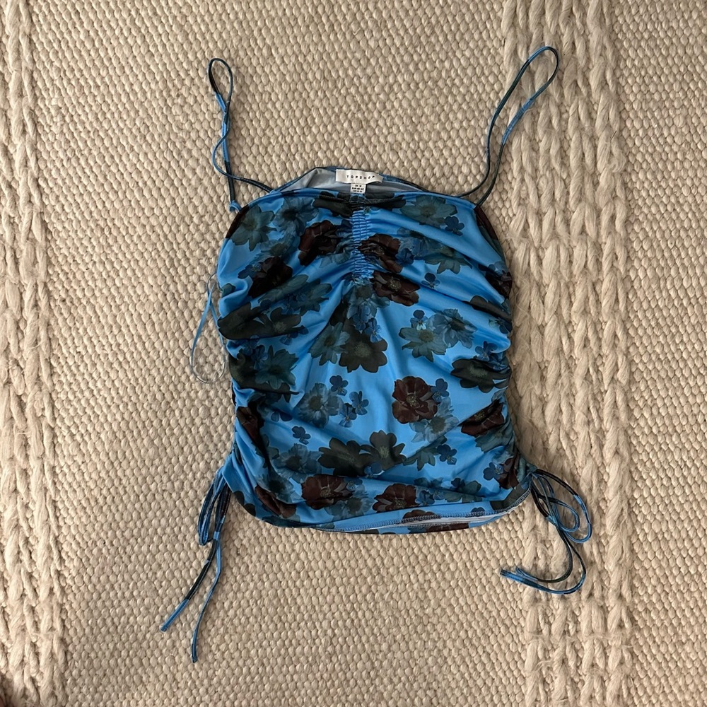 Spaghetti strap top, Silky blue with flowers, cinched and tied at each side